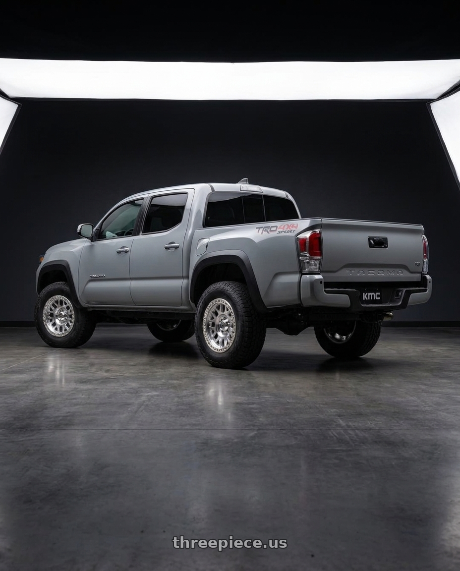 2021 Toyota Tacoma TRD Sport with KMC KM234 GRENADE DESERT BEADLOCK 6X139.7 17X8.5 +0 MACHINED wheels rear three quarter view square tires