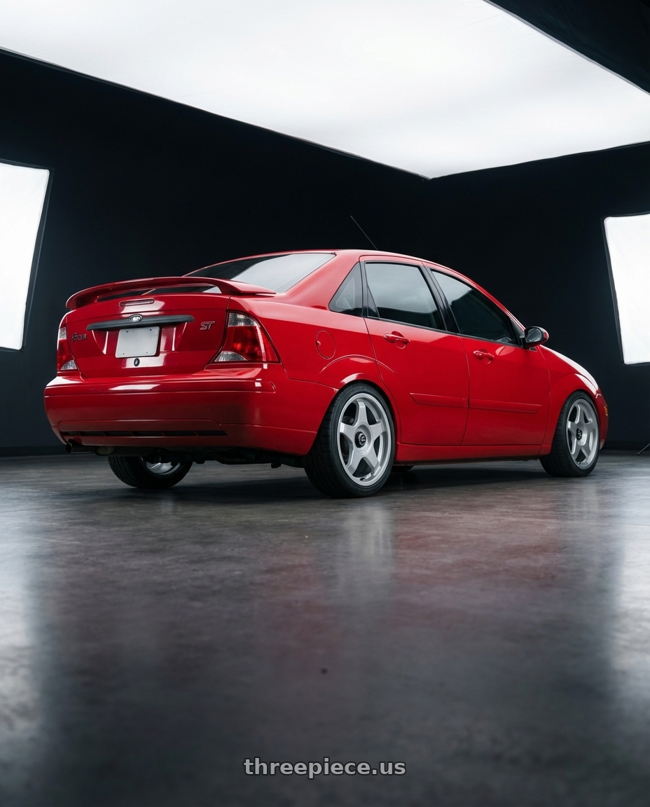 2006 Ford Focus ZX4 ST with fifteen52 CHICANE 4x100 / 4x108 17x7.5 +42 SPEED SILVER (GLOSS SILVER) wheels rear three quarter view slight stretch tires