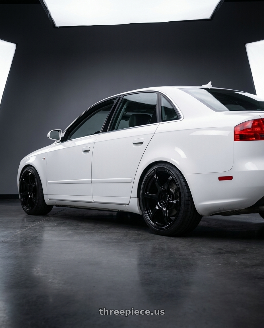 2010 Audi A4 B7 with Advan RGIII 5x112 18x8+50 Gloss Black wheels rear three quarter view square tires