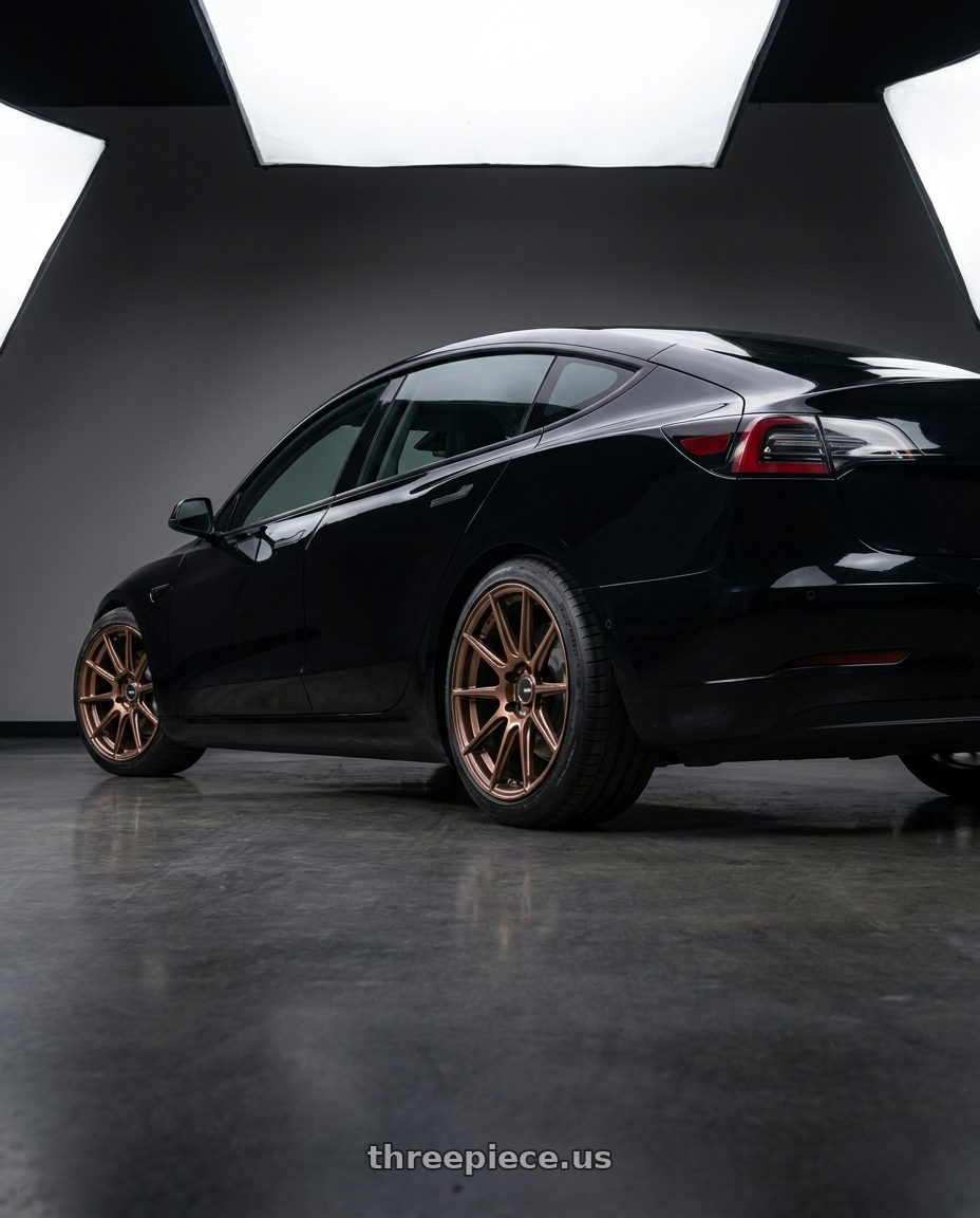 2022 Tesla Model 3 base black with Enkei TS10 5x114.3 18x9.5+35 Dia Copper wheels rear three quarter view square tires