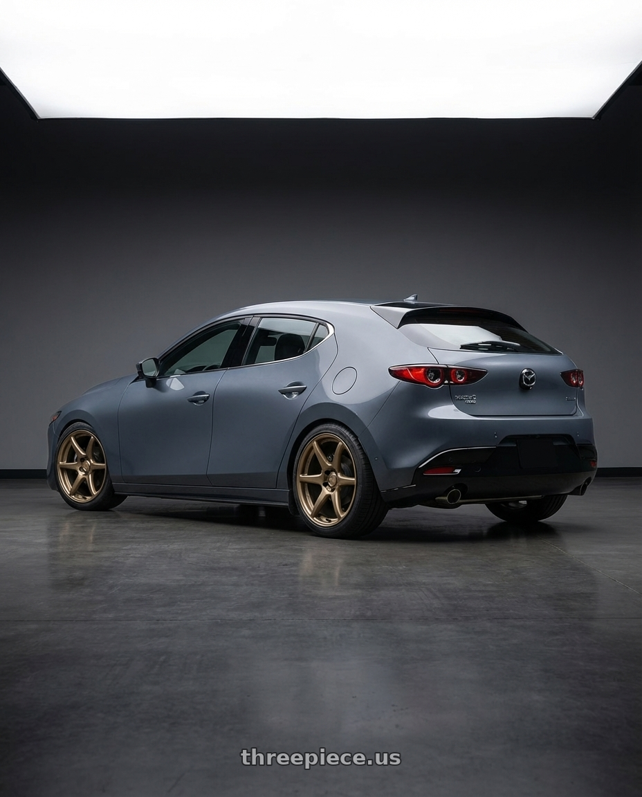 2023 Mazda Mazda3 Turbo with Kansei K11B Tandem 5x114.3 18x9 35 Bronze wheels rear three quarter view square tires