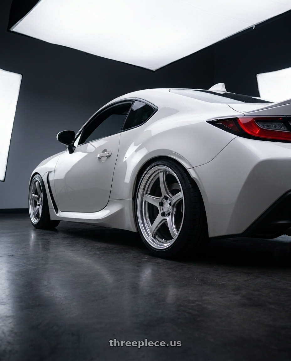 2023 Toyota GR86 White with Work T5R 2P 5x100 18x7.5 +45 GT SILVER wheels rear three quarter view square tires