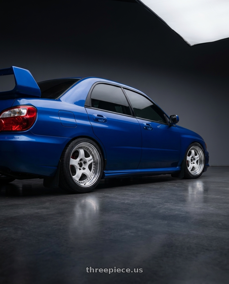 2003 Subaru Impreza wrx with Work Meister S1 3P 5x114.3 17x10.5+4 W Disk White wheels rear three quarter view square tires