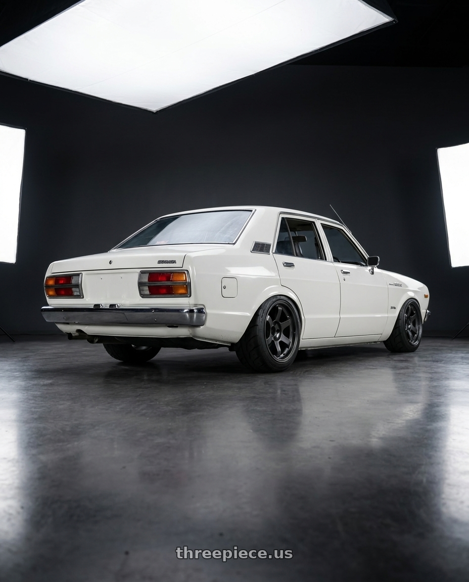 1977 Datsun Stanza with 9six9 SIX-1 Truck 6x139.7 18X9 +0 Carbon Gray wheels rear three quarter view meaty tires