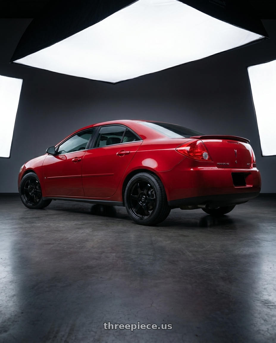 2008 Pontiac G6 GT with Vors LT61 5x110 17x7.5 +35 Gloss Black wheels rear three quarter view square tires