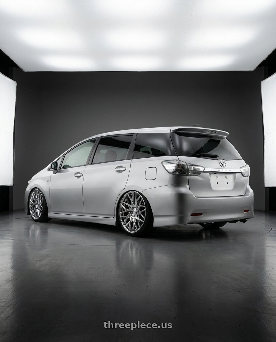 2016 Toyota wish 20 with ECLIPSE 101 5X108 20x8.5 +38 CHROME wheels rear three quarter view slight stretch tires