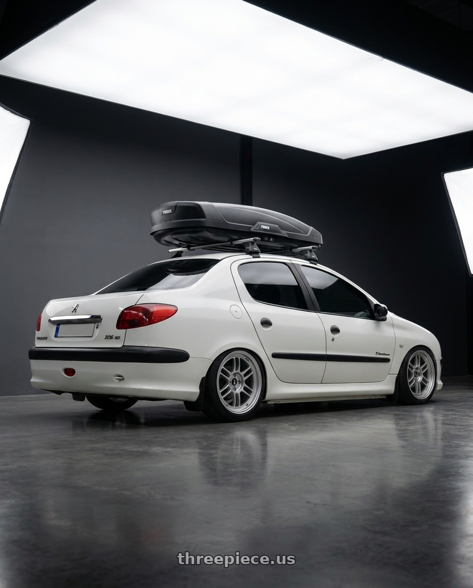 2011 Peugeot 206 SD with Enkei RPF1 4x100 17x7+35 Silver wheels rear three quarter view square tires