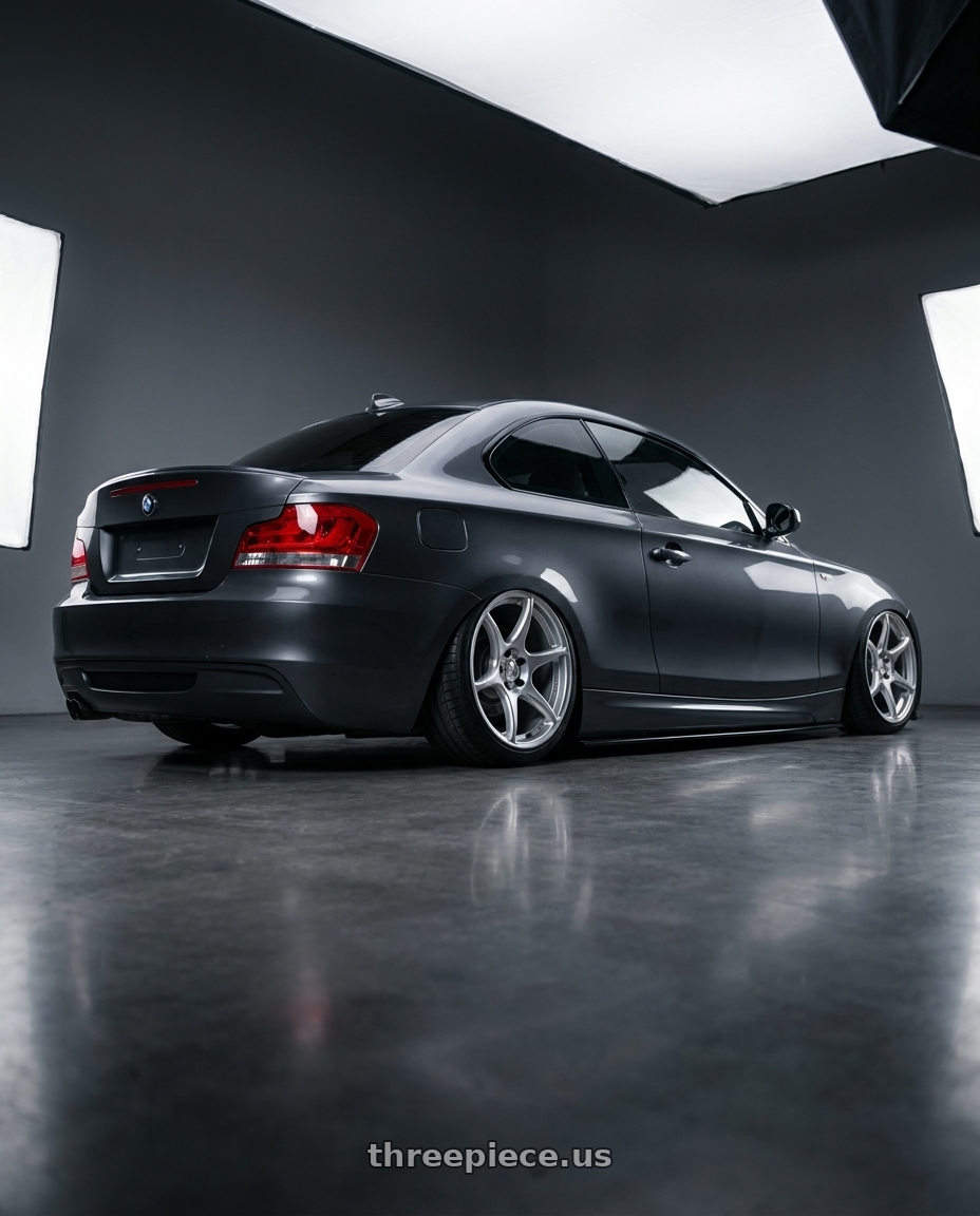 2012 BMW 1 Series E82 with Kansei K11S Tandem 5X120 19x10.5 22 Hyper Silver wheels rear three quarter view slight stretch tires