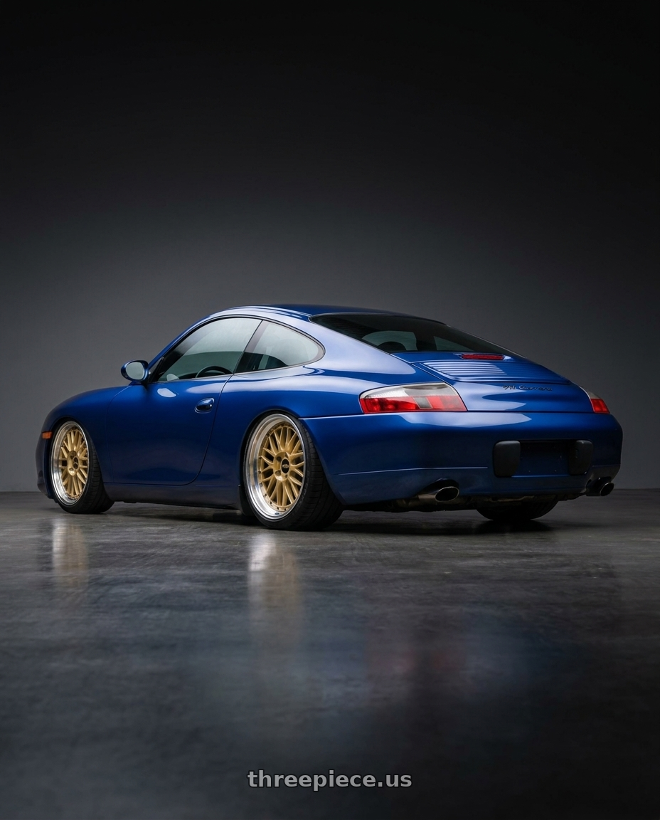 2002 Porsche 911 carrera blue with BBS LM 5x114.3 18x9.0+42 Gold wheels rear three quarter view slight stretch tires