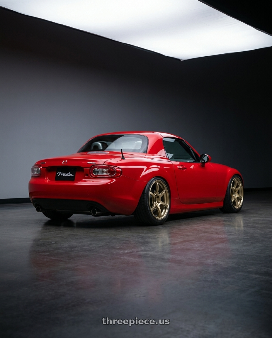 2012 Mazda MX-5 Miata NC with Advan RGIII 5x114.3 17x8.0+45 Gold wheels rear three quarter view slight stretch tires