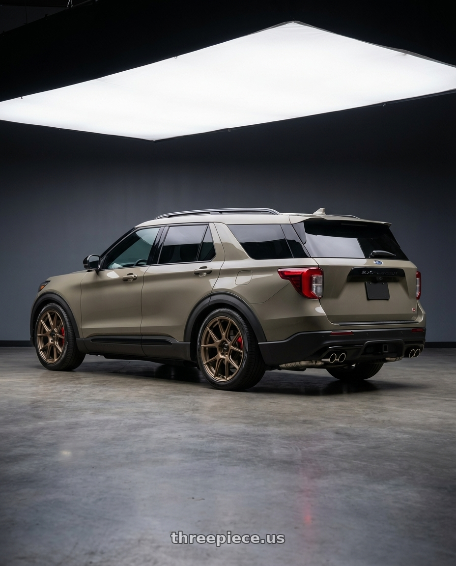 2026 Ford Explorer ST Marsh Grey with Konig Ampliform 5x114.3 19x10.5+23 Gloss Bronze wheels rear three quarter view slight stretch tires