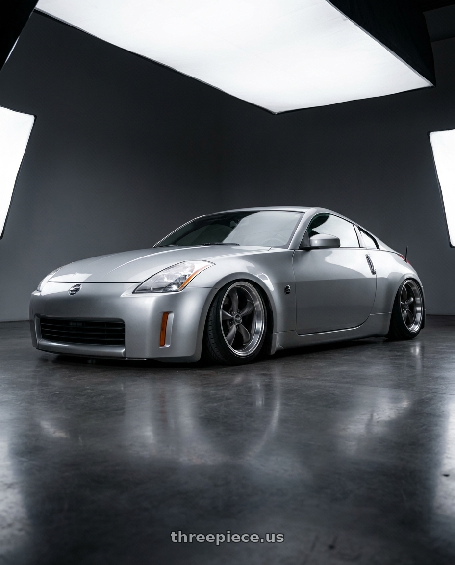 2004 Nissan 350z fitted with American Racing AR105 TORQ THRUST M 5X100 17X7.5 +45 ANTHRACITE W/ MACHINED LIP $269 wheels