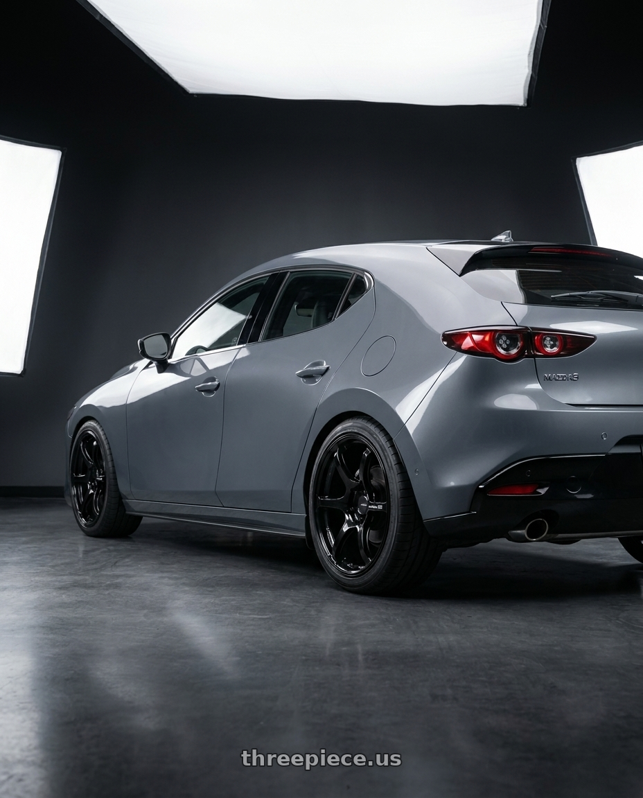 2024 Mazda Mazda3 Fastback  with Advan RGIII 5x114.3 18x8.0+45 Gloss Black wheels rear three quarter view square tires