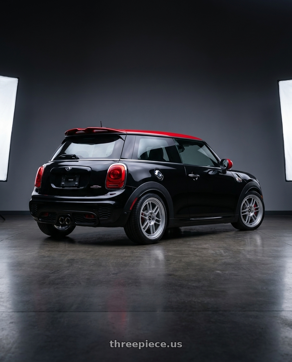 2017 mini John cooper works with Enkei RPF1 5x112 18x8+35 Silver wheels rear three quarter view square tires