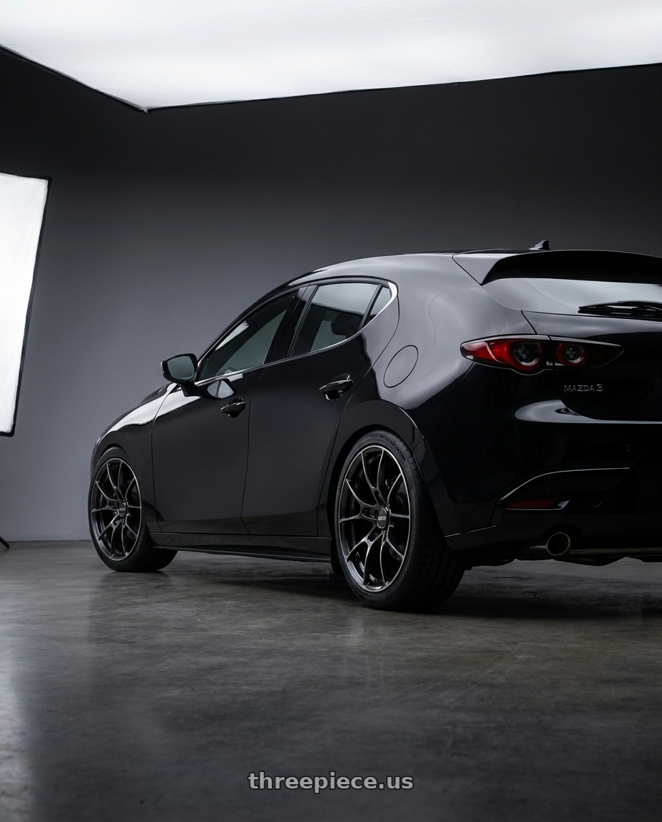2023 mazda 3 with Volk Racing G025 5x114.3 18x8.0+45 Shining Black Metal / Rim Edge DC wheels rear three quarter view square tires