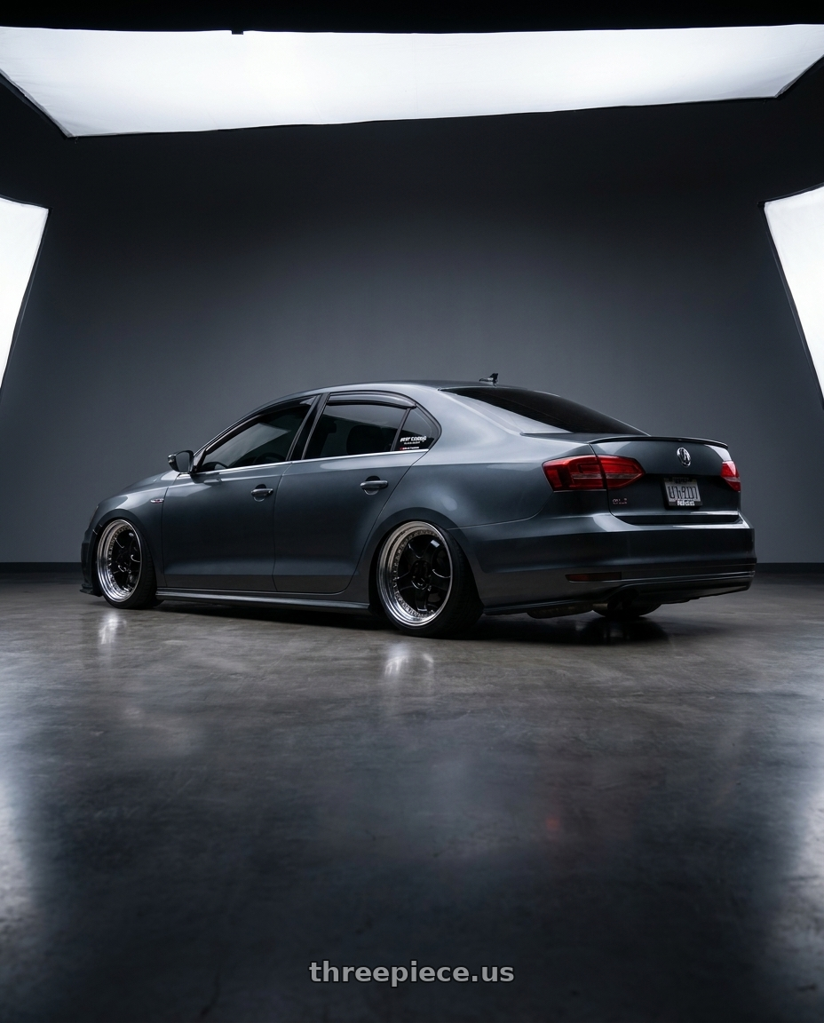 2016 VW gli with Work Meister S1 3P 5x114.3 18x8.5+37 R Disk Black wheels rear three quarter view slight stretch tires