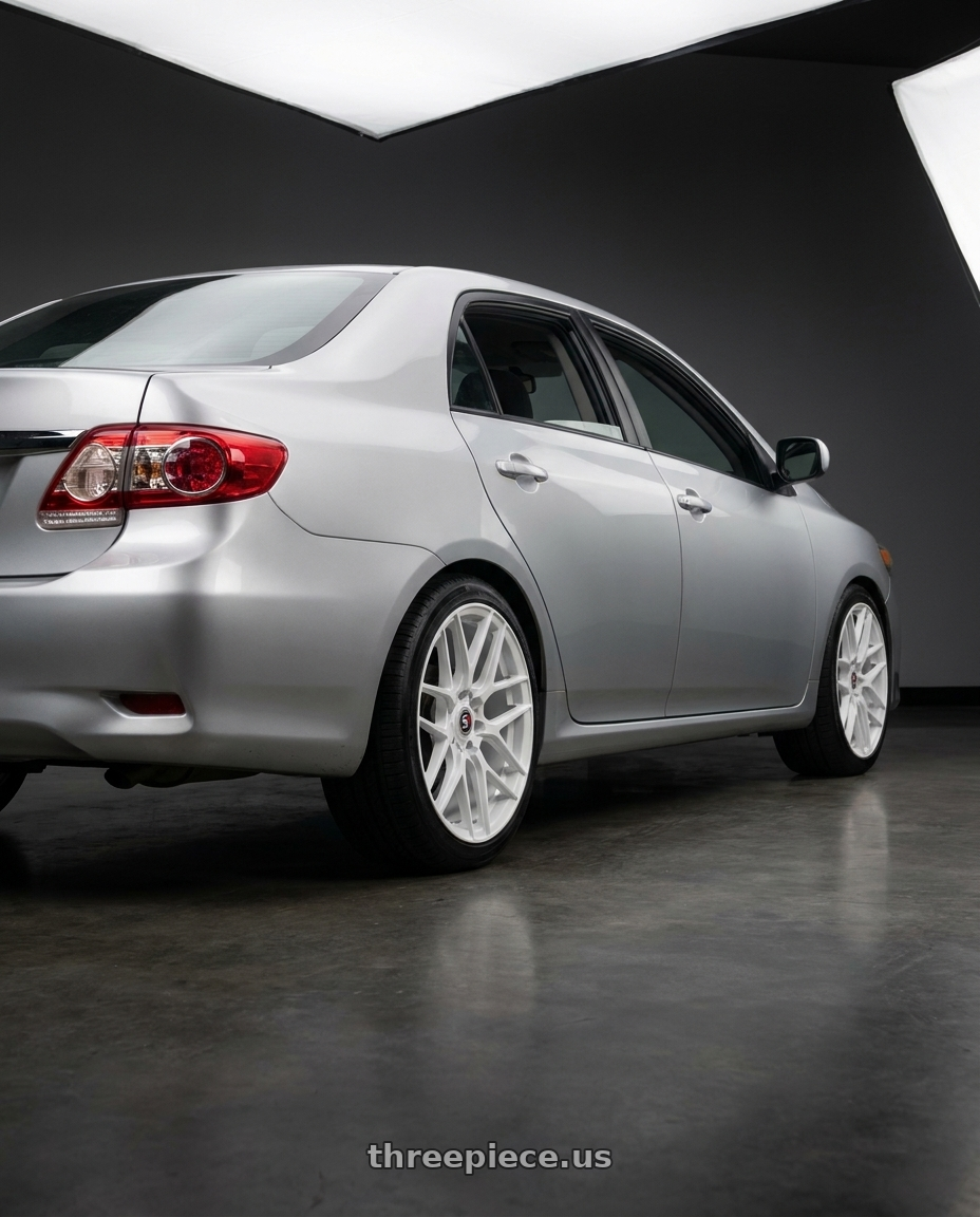 2013 Toyota Corolla with Spec-1 SP-78 5x100/5x114.3 17x7.5 +35 All White wheels rear three quarter view square tires