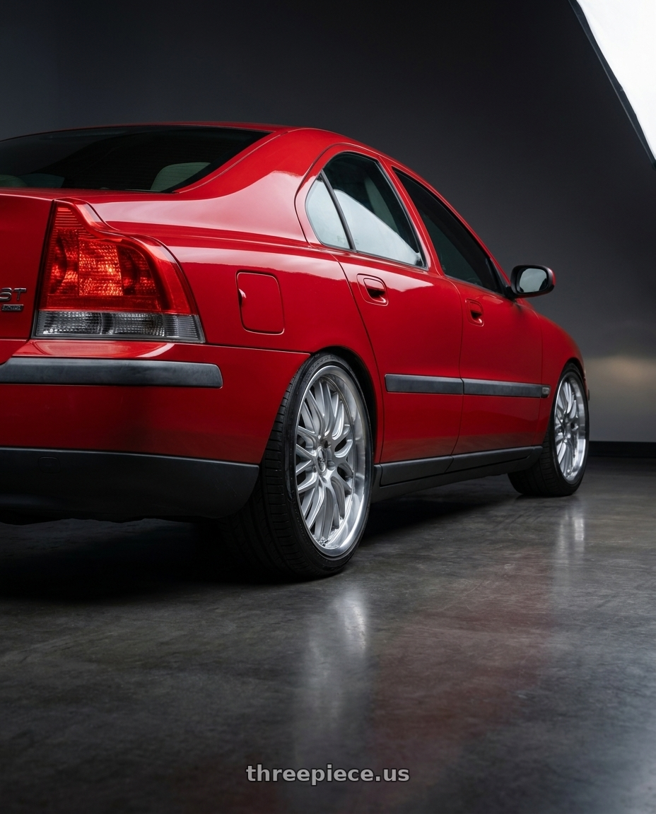 2002 Volvo s60 2.4t with V�xx Masi 5x108 17x7.5+40 Silver Mirror Mach Lip wheels rear three quarter view slight stretch tires