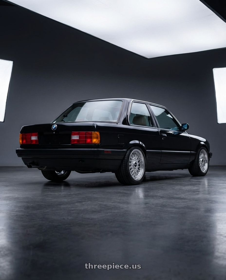 1991 bmw 325i coupe, black with Work Seeker Fx 4x100 16x6.5+22 L Disk Matte Silver Polish wheels rear three quarter view square tires