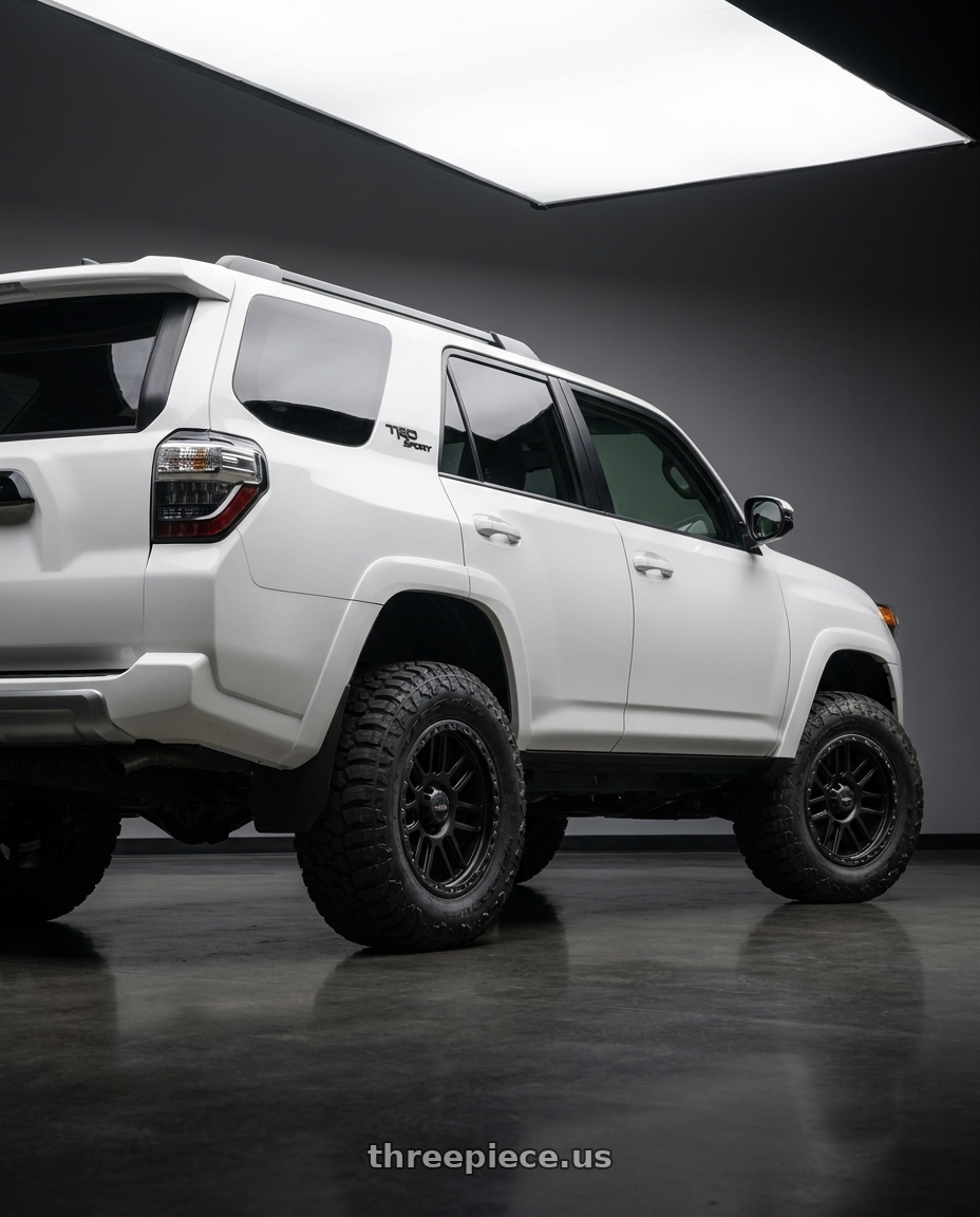 2022 Toyota 4Runner with Vision Off-Road 111 Nemesis 6x139.7 20x9+10 Matte Black wheels rear three quarter view meaty tires