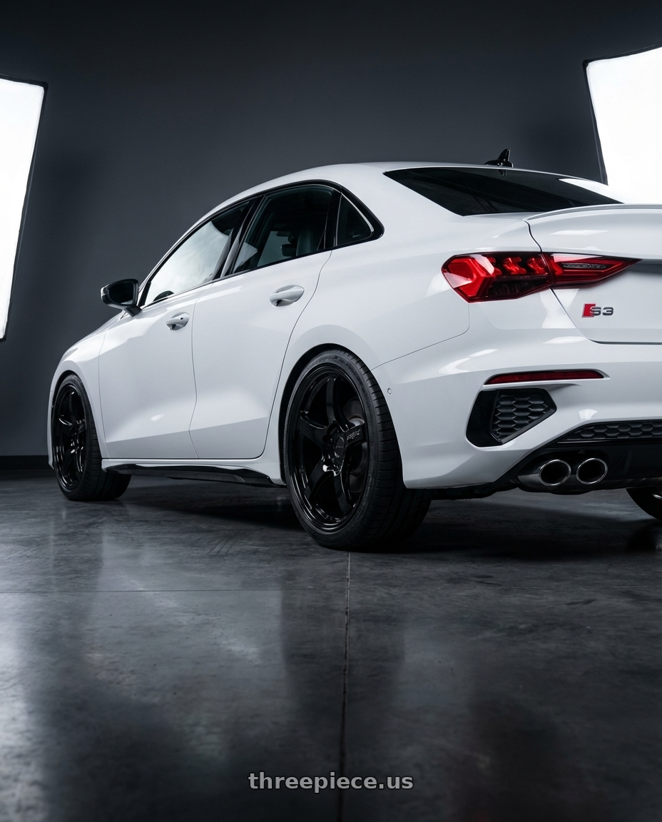 2024 Audi S3 8Y with Gram Lights 57CR 5x112 19x10.5+22 Glossy Black wheels rear three quarter view square tires