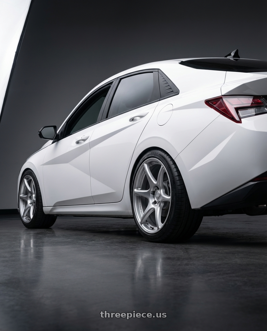2024 Hyundai Elantra N with Kansei K11S Tandem 5x114.3 19x9.5 12 Hyper Silver wheels rear three quarter view square tires