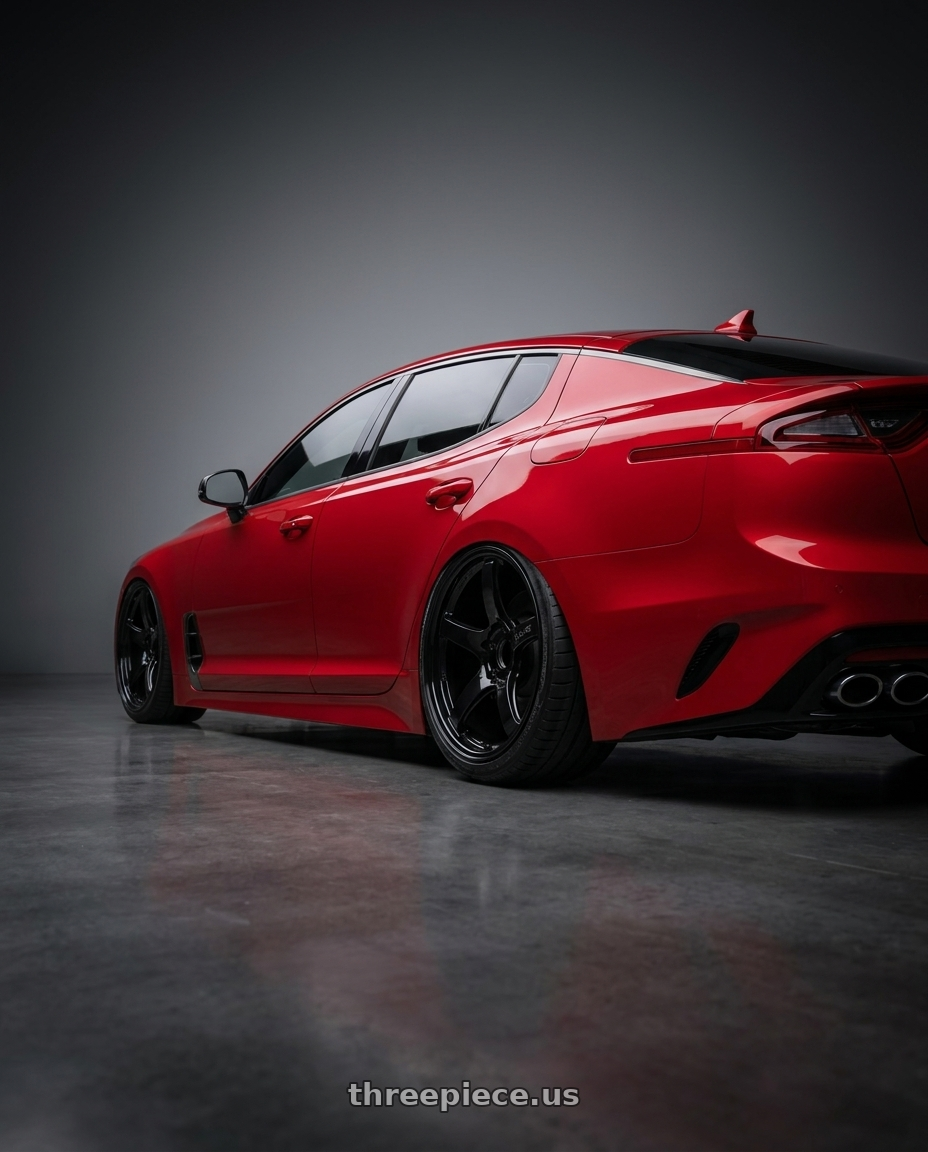 2022 Kia Stinger GT with Gram Lights 57CR 5x114.3 19x8.5+35 Glossy Black wheels rear three quarter view slight stretch tires