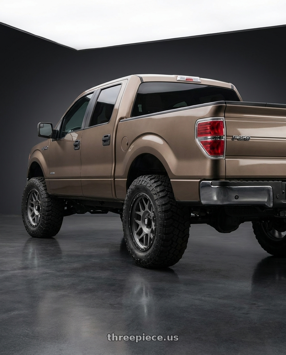 2013 Ford F-150 with XD XD127 BULLY 6X135 20X9 +18 MATTE GRAY BLACK RING wheels rear three quarter view meaty tires