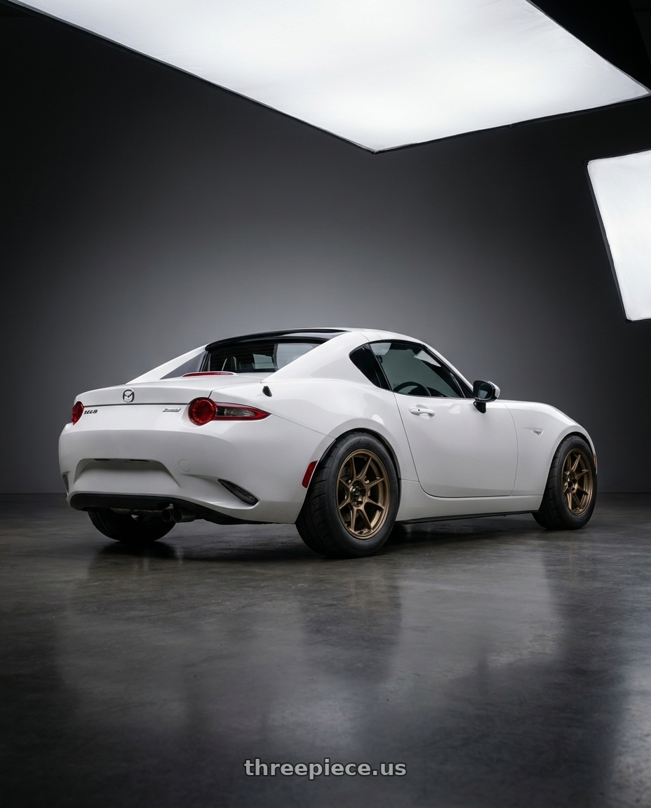 2024 nd mx5 with Konig Dekagram 4x100 15x7.5+35 Gloss Bronze wheels rear three quarter view meaty tires