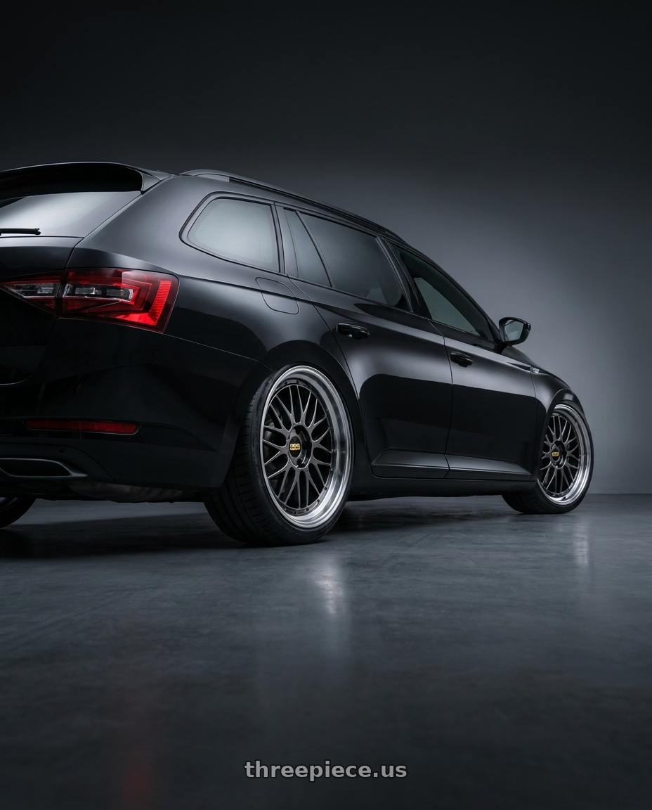 2026 Superb combi  with BBS LM 5x114.3 18x8.0+35 Diamond Black wheels rear three quarter view square tires