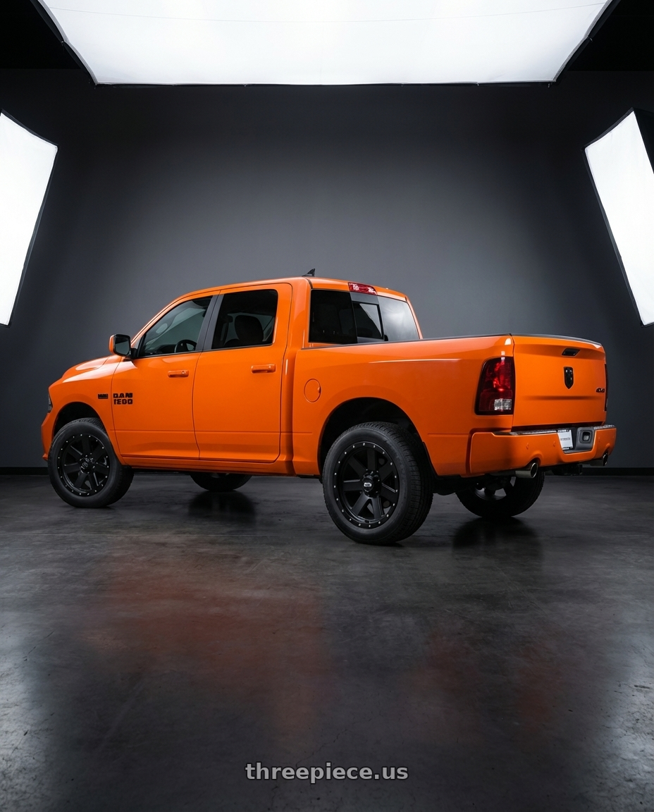 2017 RAM 1500 with Ion Type 134 5x139.7 20x10-19 Matte Black/Black Beadlock wheels rear three quarter view square tires