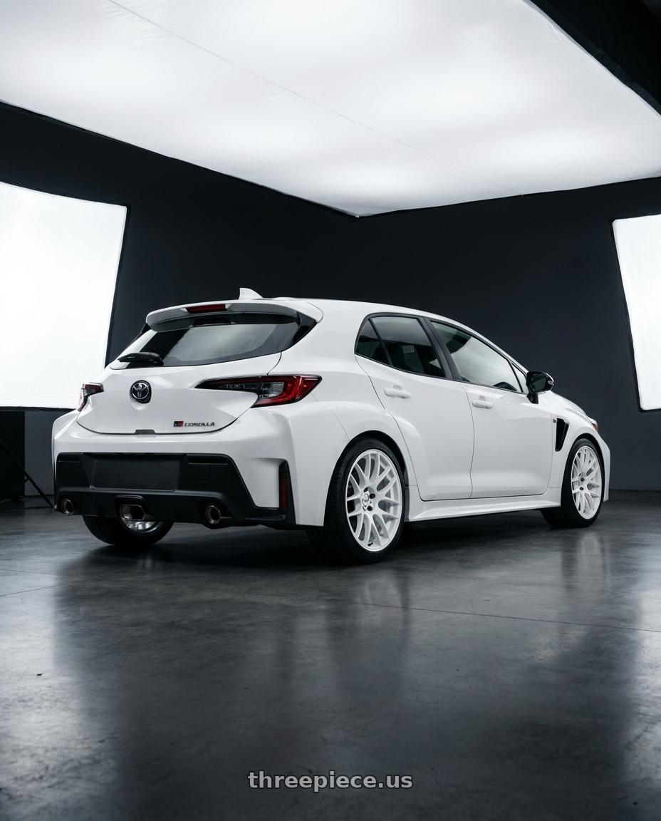 2026 GR Corolla base with Work Emotion m8r 5x114.3 18x8.5 +30 White wheels rear three quarter view square tires