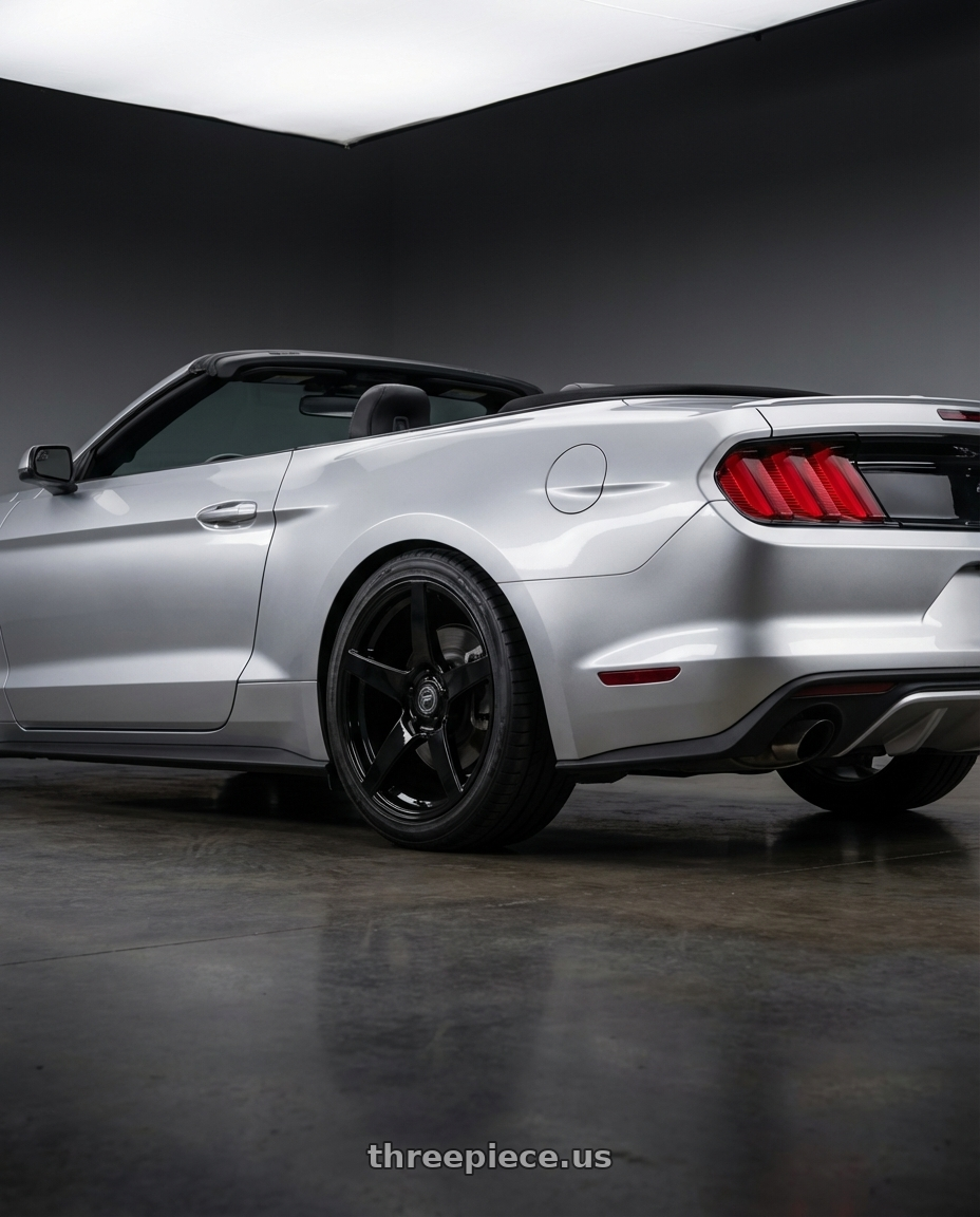 2018 ford mustang with Forgestar CF5 5x114.3 19x9 +35 Gloss Black wheels rear three quarter view slight stretch tires