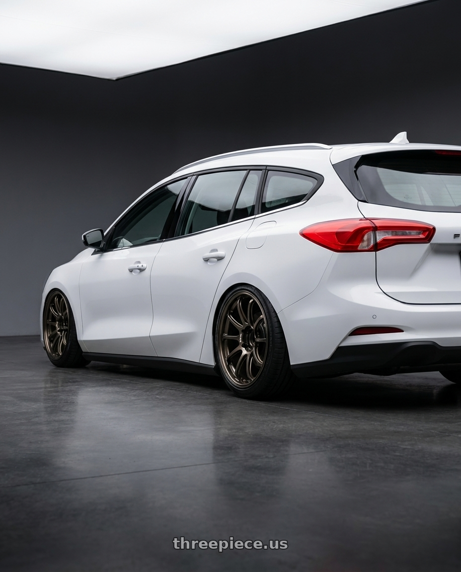 2025 Ford focus wagon ehite with Advan Racing RS-DF Progressive 5x114.3 18x8+44 Dark Bronze Metallic wheels rear three quarter view slight stretch tires
