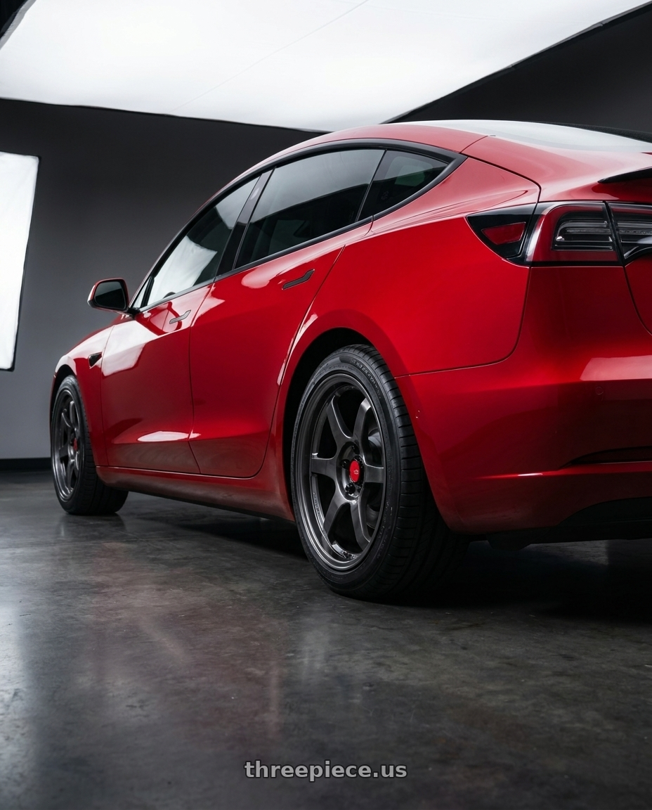 2022 Tesla Model 3 Performance with Aodhan AH08 5x114.3 18x9.5+30 Hyper Black wheels rear three quarter view square tires
