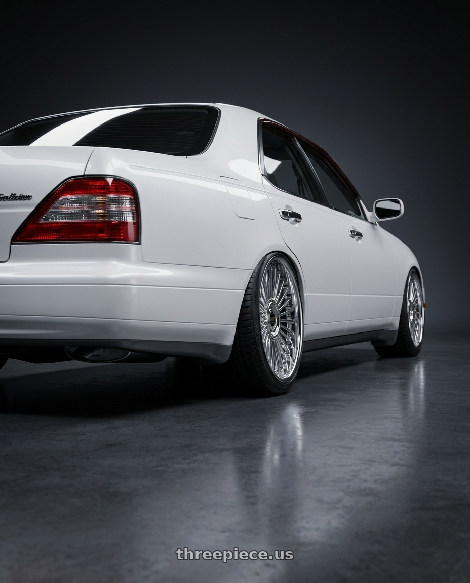 1998 nissan gloria y33 with Work Emitz wheels rear three quarter view slight stretch tires