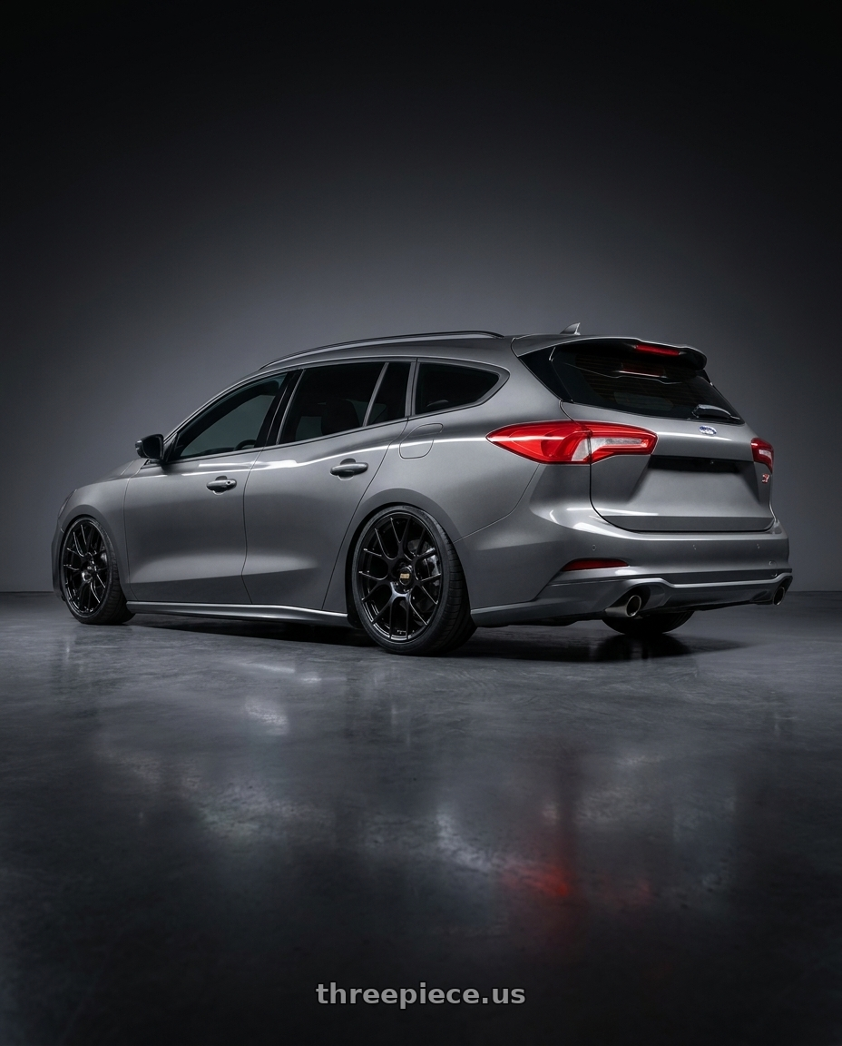 2025 ford focus wagon ST gray with BBS RE-V7 5x120 19x8.5 +35 Gloss Black wheels rear three quarter view square tires
