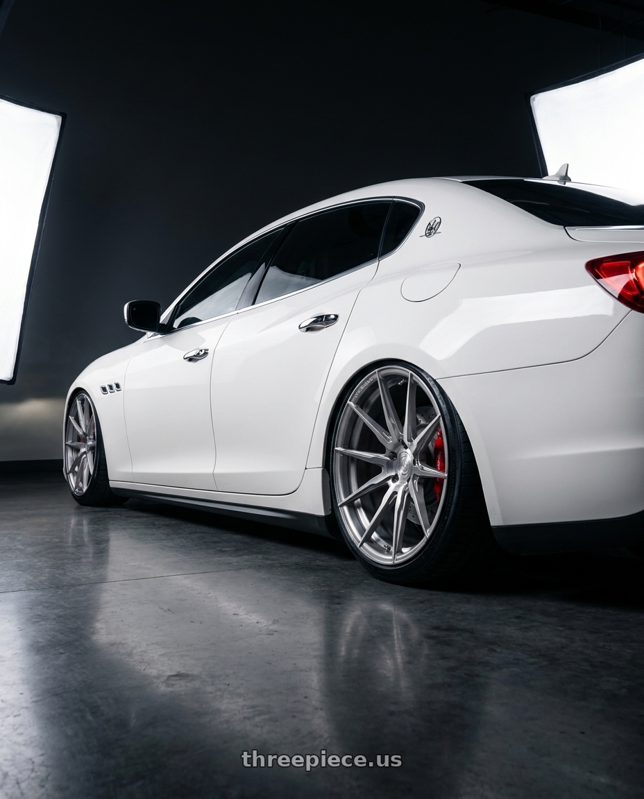 2014 maserati quattroporte gts  with Rohana RFX2 5x114.3 20x11+43 Brushed Titanium wheels rear three quarter view slight stretch tires