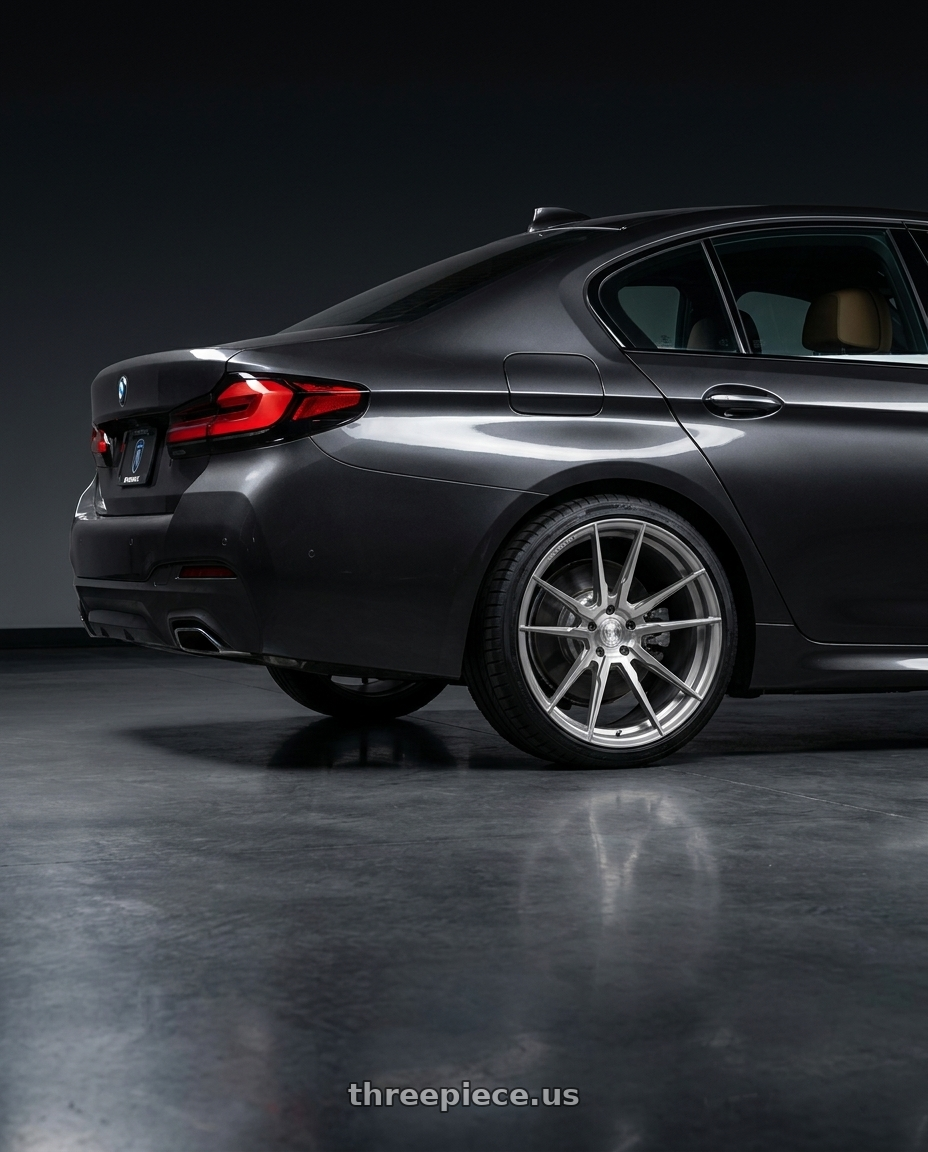 2021 bmw 5 with Rohana RFX2 5x112 19x8.5+33 Brushed Titanium wheels rear three quarter view square tires