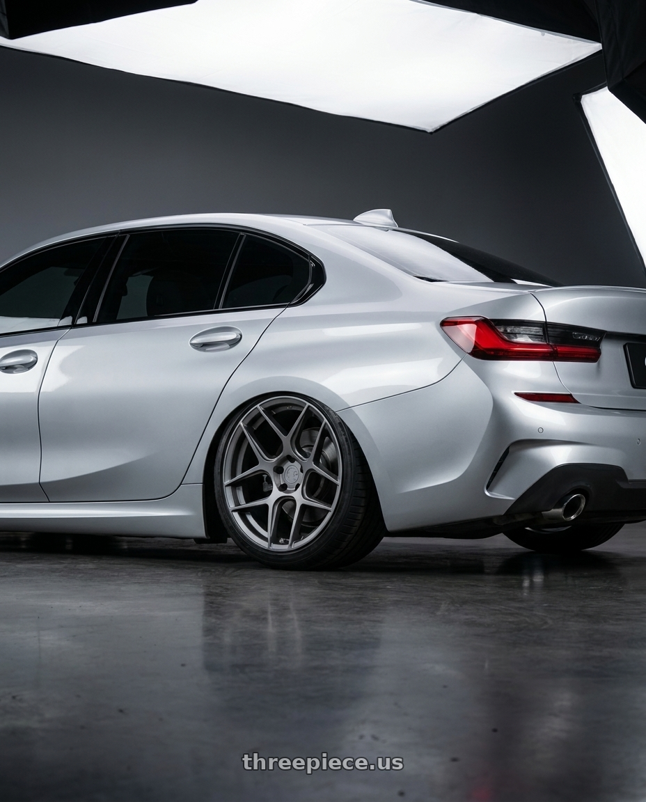 2023 BMW 3 Series G20 with Aodhan AFF2 5x112 19x9.5+35 Matte Gray wheels rear three quarter view slight stretch tires
