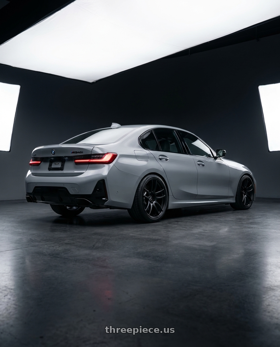 2024 BMW M340i with Work Emotion Cr Kiwami 5x112 19x8.5 +25 Matte Black wheels rear three quarter view slight stretch tires