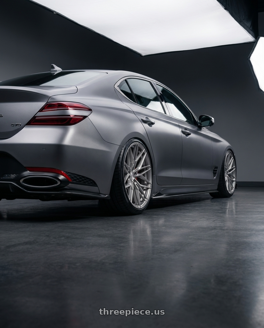 2024 Genesis g70 with Rohana RFX17 5x114.3 20x10+40 Brushed Titanium wheels rear three quarter view slight stretch tires