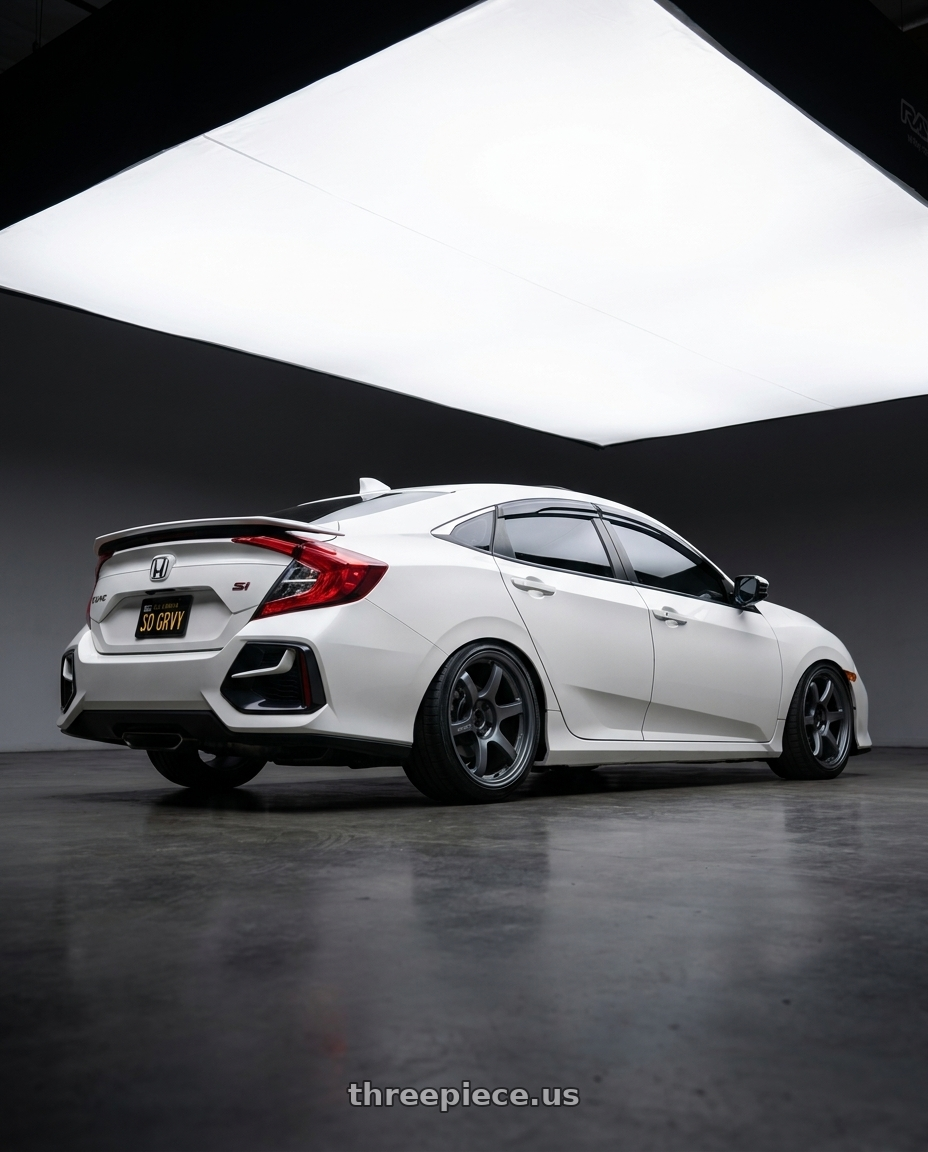 2020 Honda Civic Si with Gram Lights 57DR 5x114.3 18x9.5+38 Gunblue II wheels rear three quarter view square tires