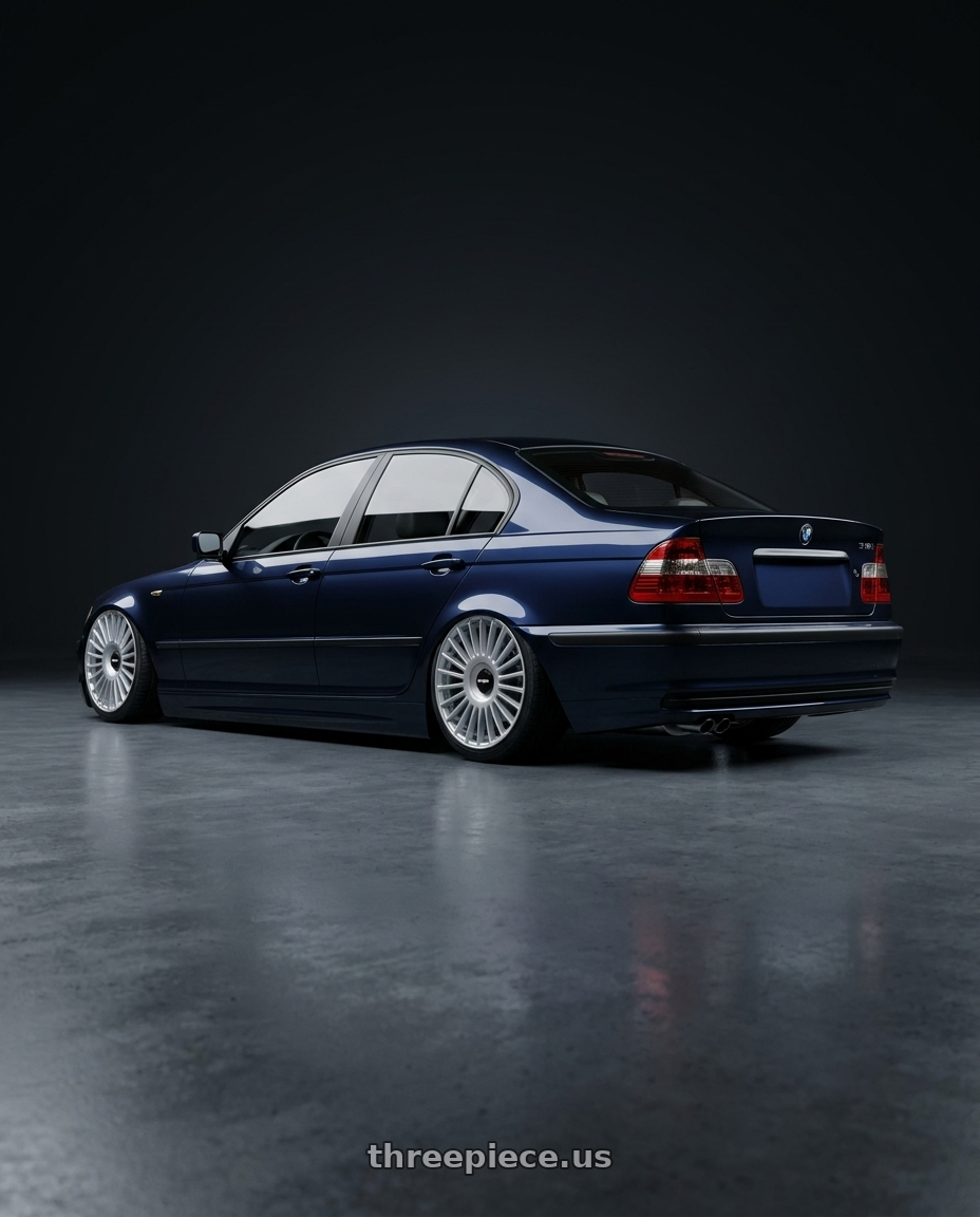 2003 bmw 318i dark blue with Rotiform RC202 GRZ BLANK 17x8 +35 GLOSS SILVER wheels rear three quarter view extreme stretch tires