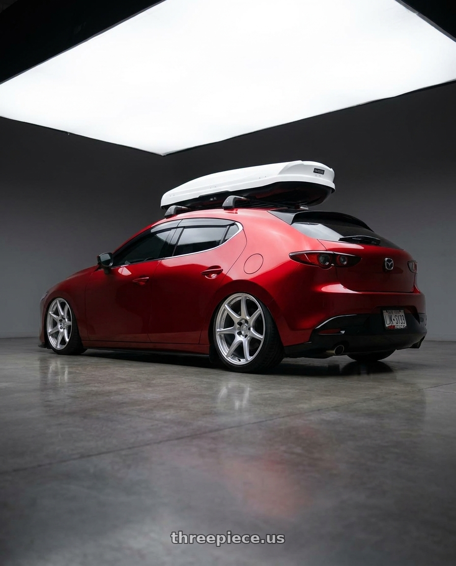 2024 Mazda 3 hatchback with Kansei K11S Tandem 5x114.3 18x8.5 35 Hyper Silver wheels rear three quarter view slight stretch tires