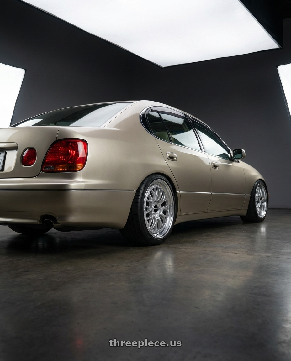 2000 lexus gs300 with Rotiform 1PC R155 LSR 5X100 18X9.5 +25 GLOSS SILVER MACHINED wheels rear three quarter view square tires