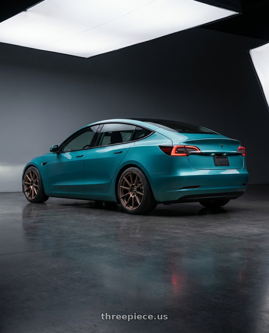 2022 Tesla Model 3 base teal with Enkei TS10 5x114.3 18x9.5+35 Dia Copper wheels rear three quarter view square tires
