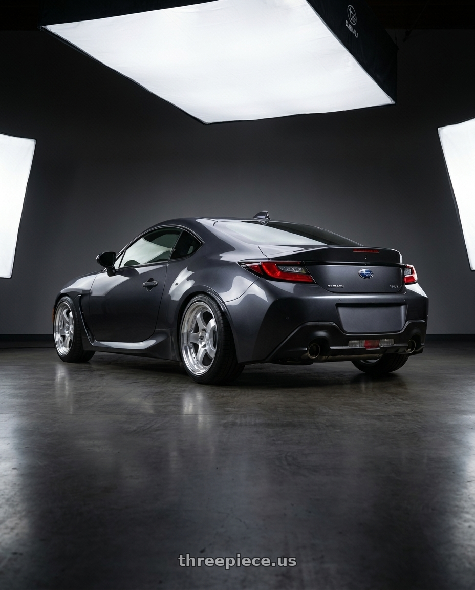 2023 Subaru BRZ premium with Aodhan AH03 5x100 18x9.5+35 Silver w/Machined Face wheels rear three quarter view square tires