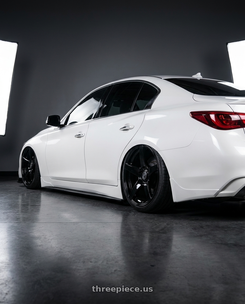 2020 Infiniti Q50 with Forgestar CF5 5x114.3 20x9.5 +29 Gloss Black wheels rear three quarter view slight stretch tires