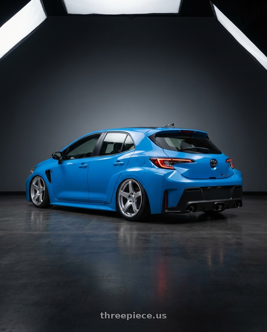 2024 Toyota GR Corolla with Ssr Gtv01 5x114.3 18x9+35  GLARE SILVER wheels rear three quarter view slight stretch tires